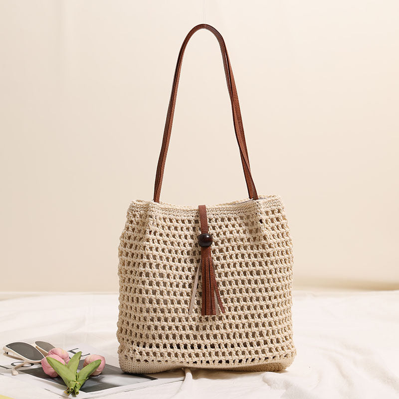 Hand-knotted basket bag with elegant leather handles Stornfield