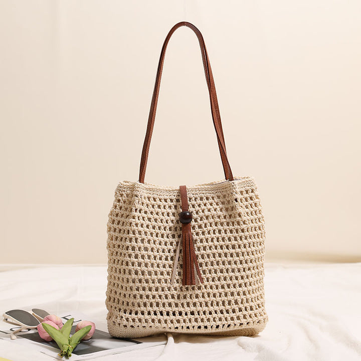 Hand-knotted basket bag with elegant leather handles Stornfield
