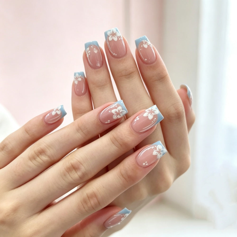 Artificial nails with floral accents Stornfield