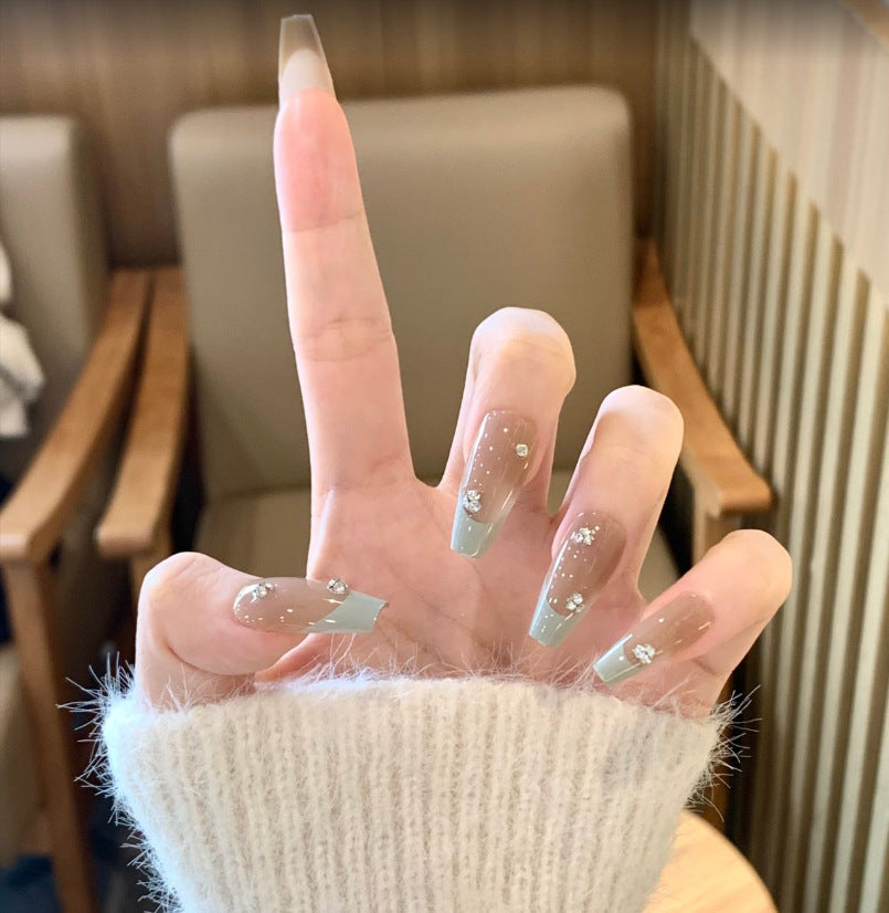 Artistic Long Stiletto Press-On Nail Set with Bow and Gemstone Accents Stornfield