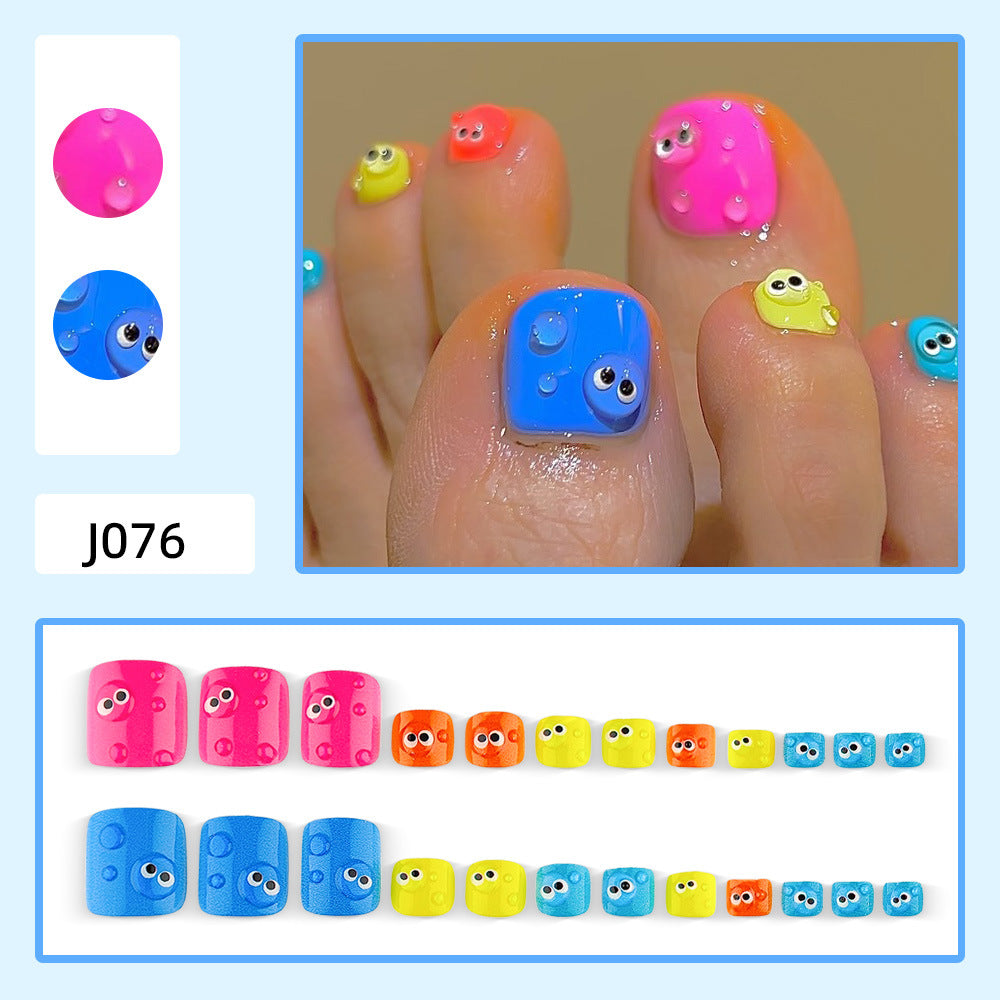 Nail art with colorful cartoon designs Stornfield