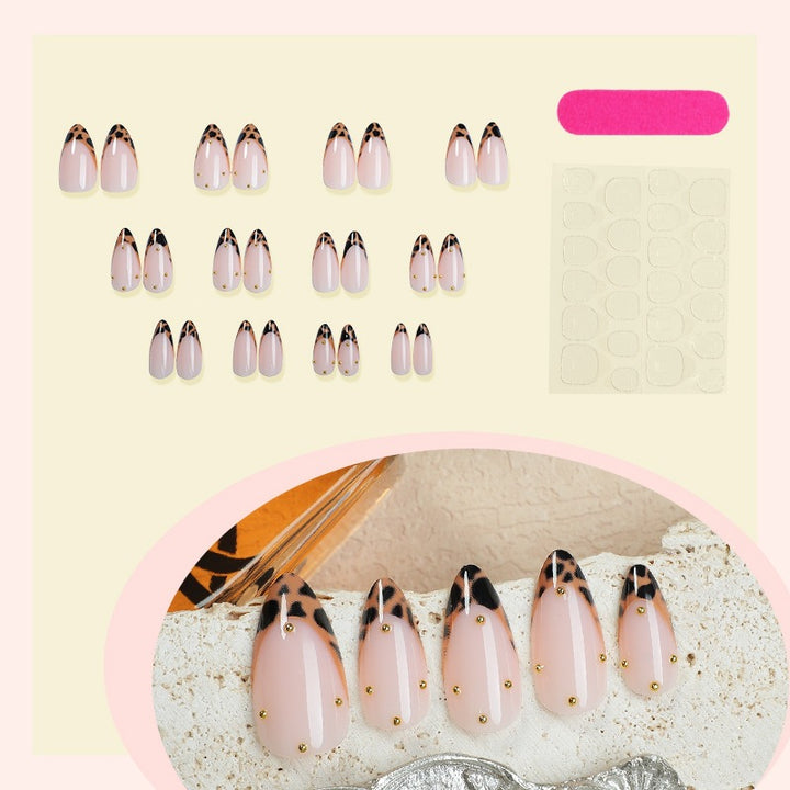 Acrylic nail set with elegant leopard design and gold accents Stornfield