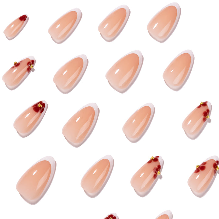 Artistic stiletto nails with luxurious floral design Stornfield