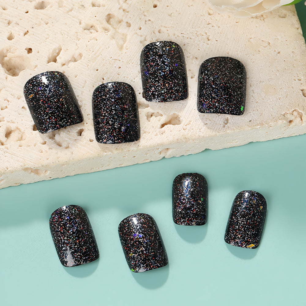 Shiny artificial nails with sparkling glitter Stornfield