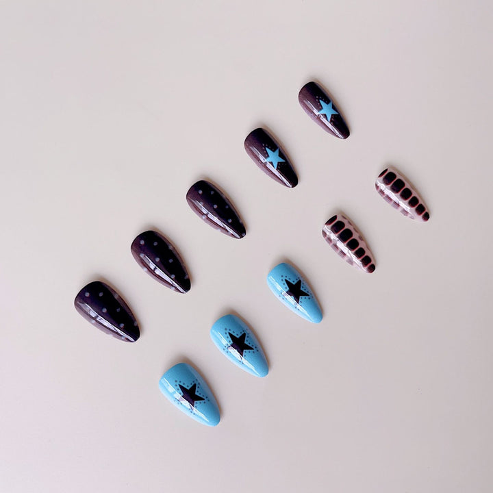 Artificial nail set with creative patterns and playful accents Stornfield