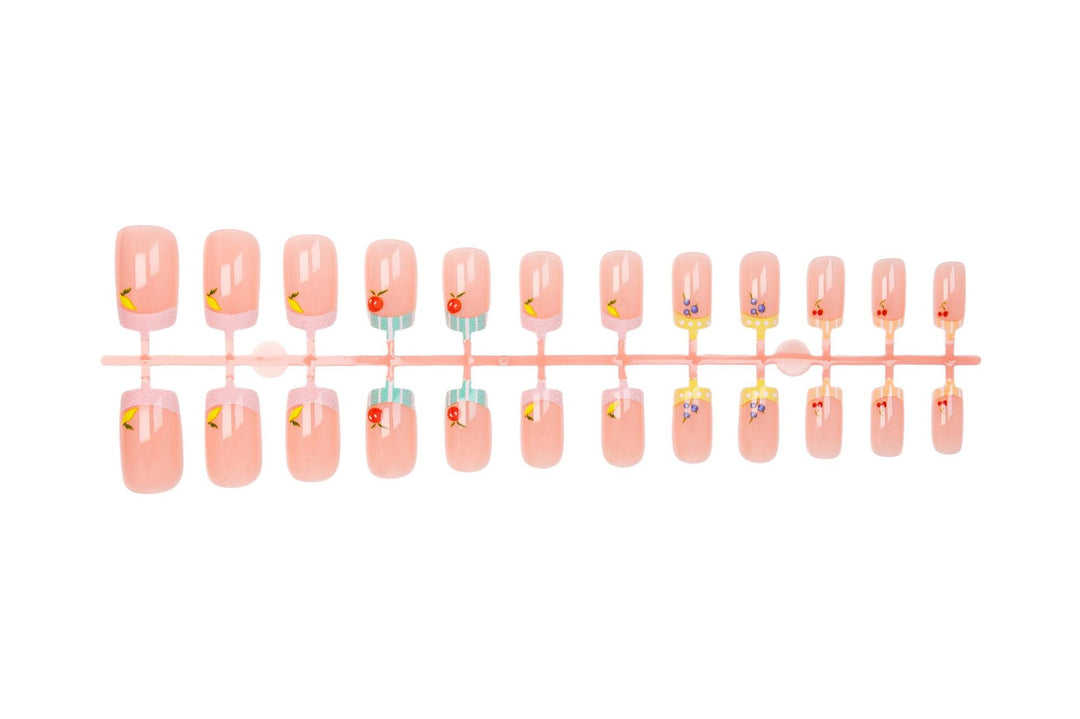 Nail art set with cheerful fruit designs and colorful accents Stornfield