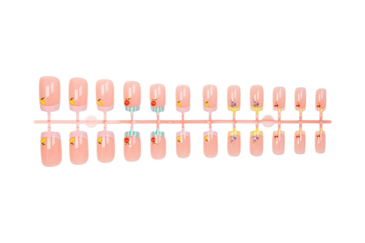 Nail art set with cheerful fruit designs and colorful accents Stornfield