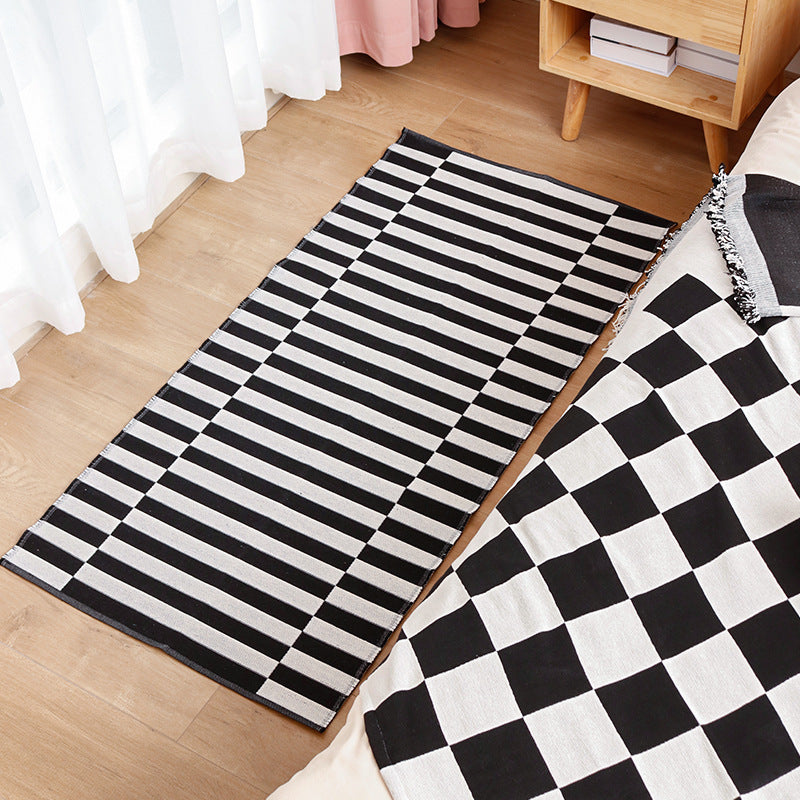 Flat-woven kitchen runner with non-slip underside and geometric diamond pattern