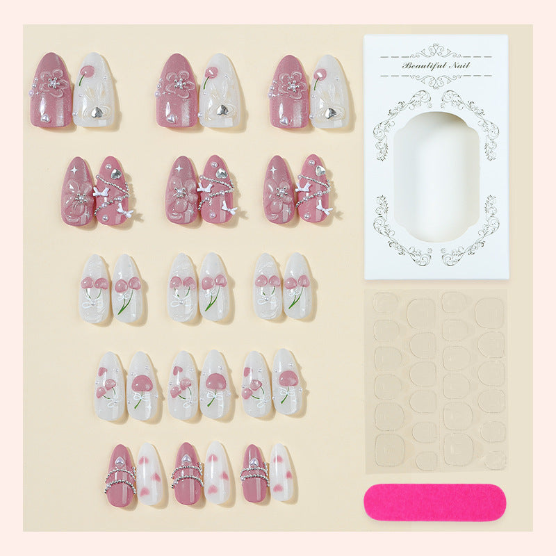 Artificial nail set with decorative floral motifs and glamorous accents Stornfield