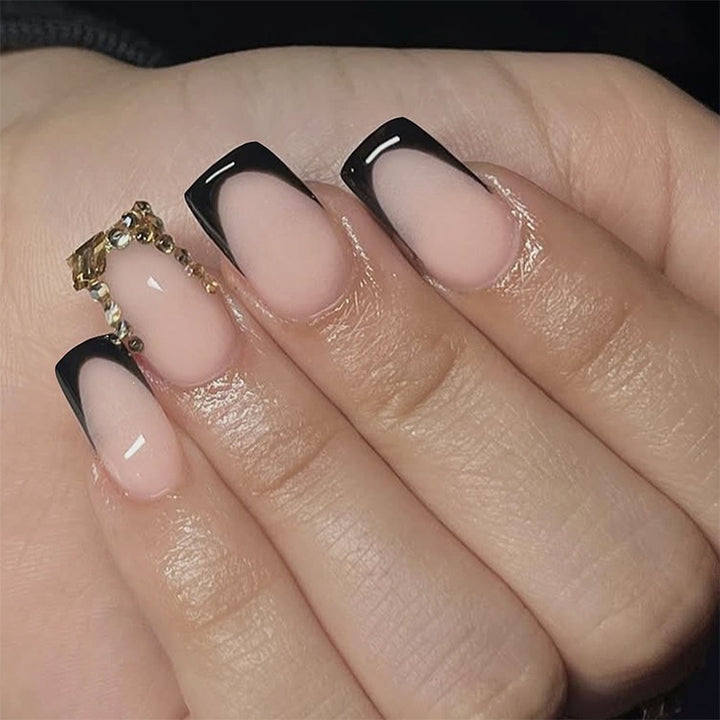 Nail set with an elegant gradient and glitter accents Stornfield