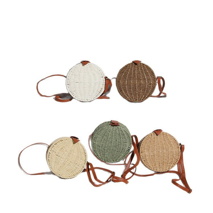 Round basket bag with leather accents Stornfield