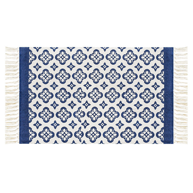 Flat-woven cotton runner with Mediterranean tile jacquard and decorative fringes Stornfield