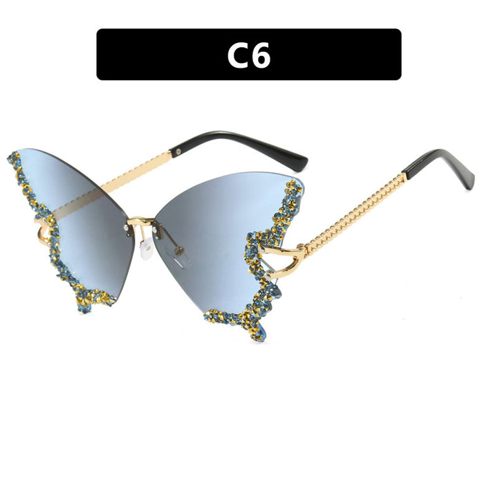 Women's large cat-eye sunglasses with sparkling rhinestone embellishment and elegant frame Stornfield