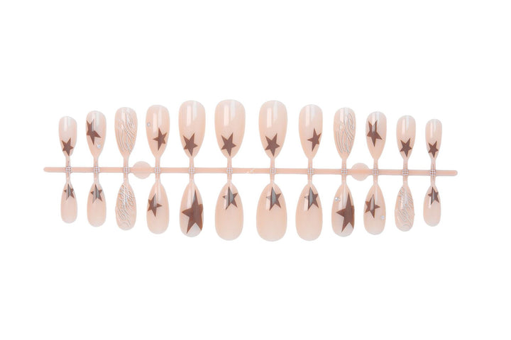 Artificial nail set with elegant star motifs and glitter accents Stornfield