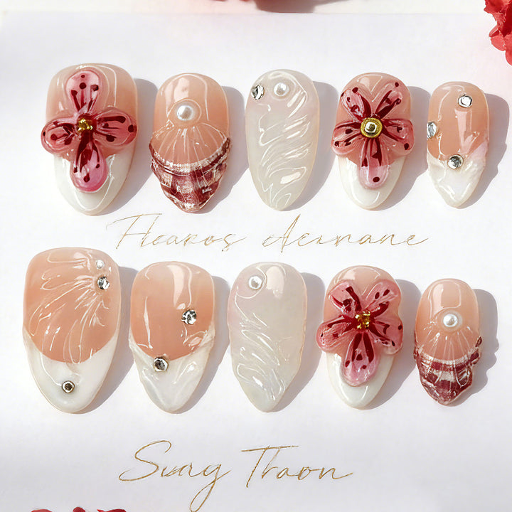 Artificial nails with handcrafted flower and glitter elements Stornfield