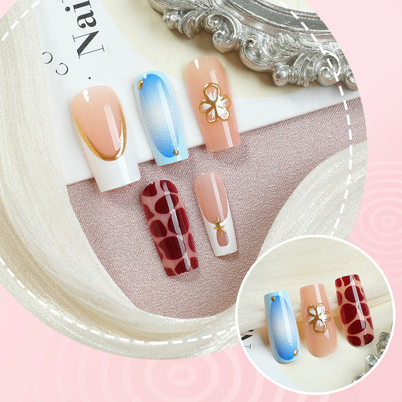 Artistic Press-On Nail Set with Floral Embellishments