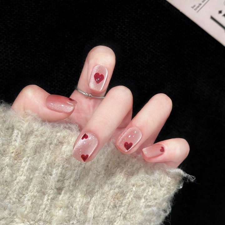 Artificial nails with elegant leopard design and glitter effects Stornfield