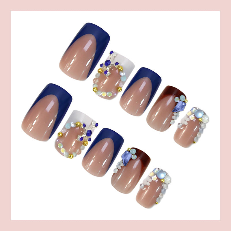 Artificial nail set with elegant stone embellishments and modern accents Stornfield