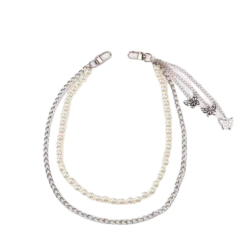 Fashionable belt with pearl and chain pendants Stornfield