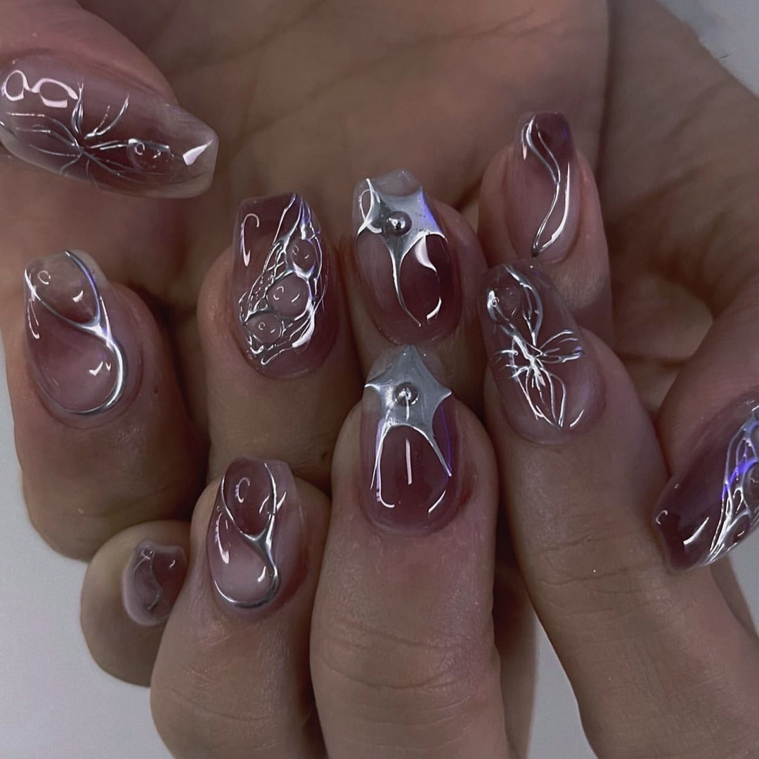 Artful Nail Extensions with Filigree Design Stornfield