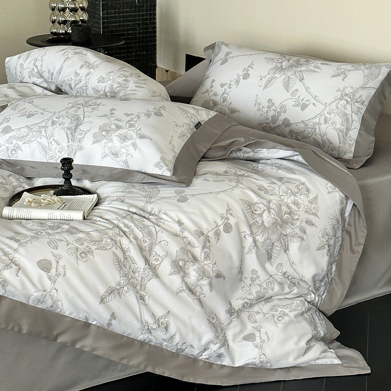 Exclusive cotton satin bed linen set with floral jacquard structure and reversible function