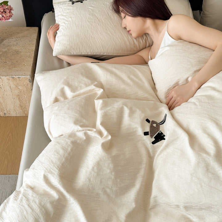 Bedding set in linen look with delicate flower embroidery