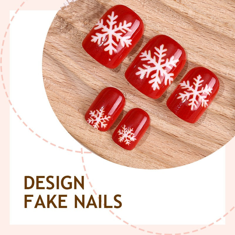 Festive artificial nails with winter snowflake patterns Stornfield