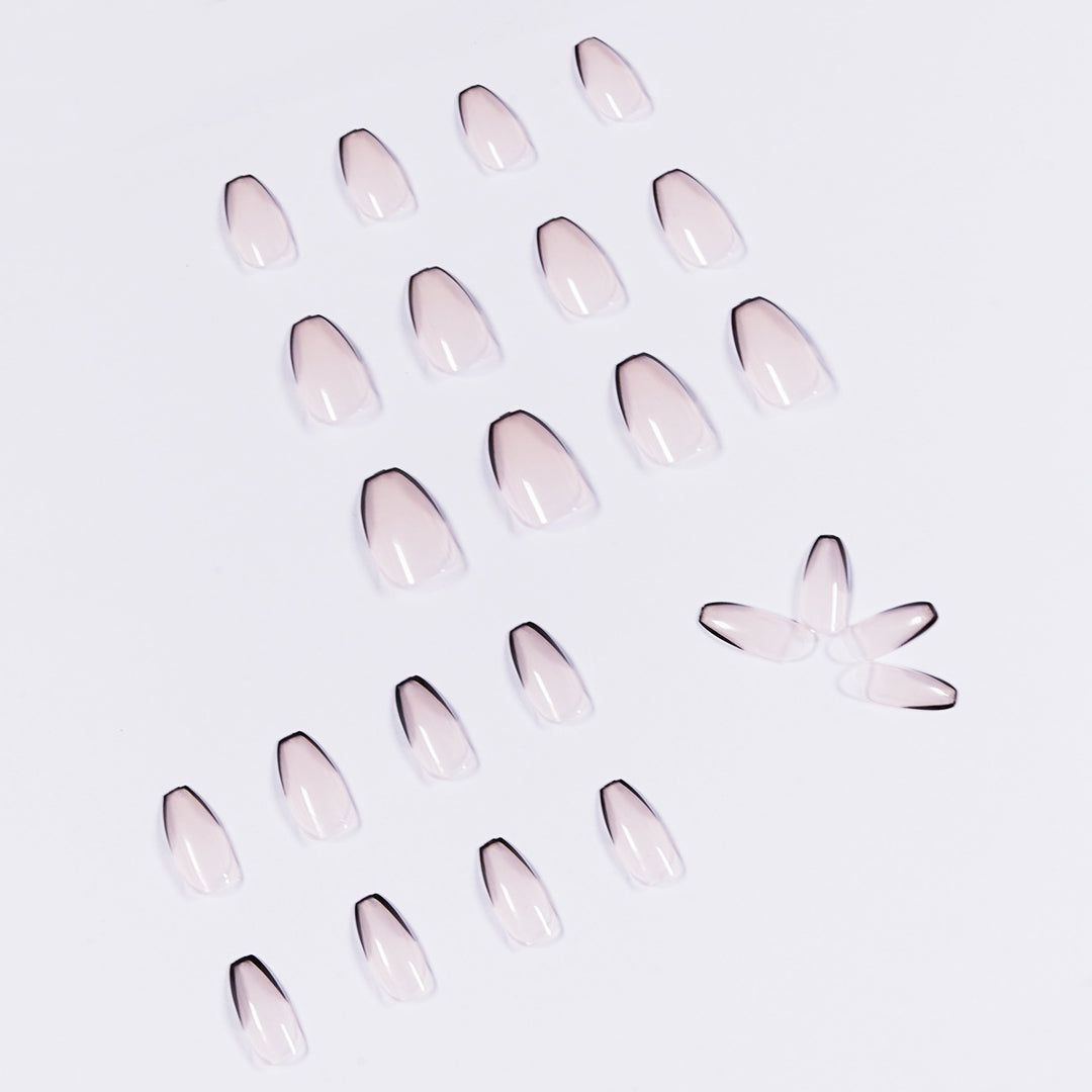 Artful stiletto nails with elegant black tip decoration Stornfield