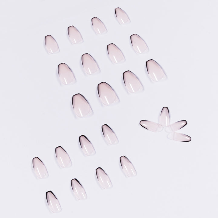 Artful stiletto nails with elegant black tip decoration Stornfield