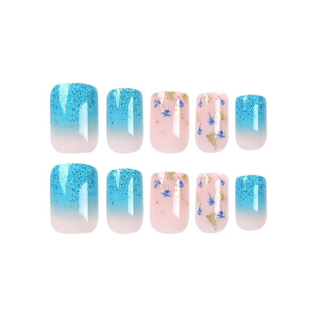 Artful acrylic nails with floral design and glitter effects Stornfield