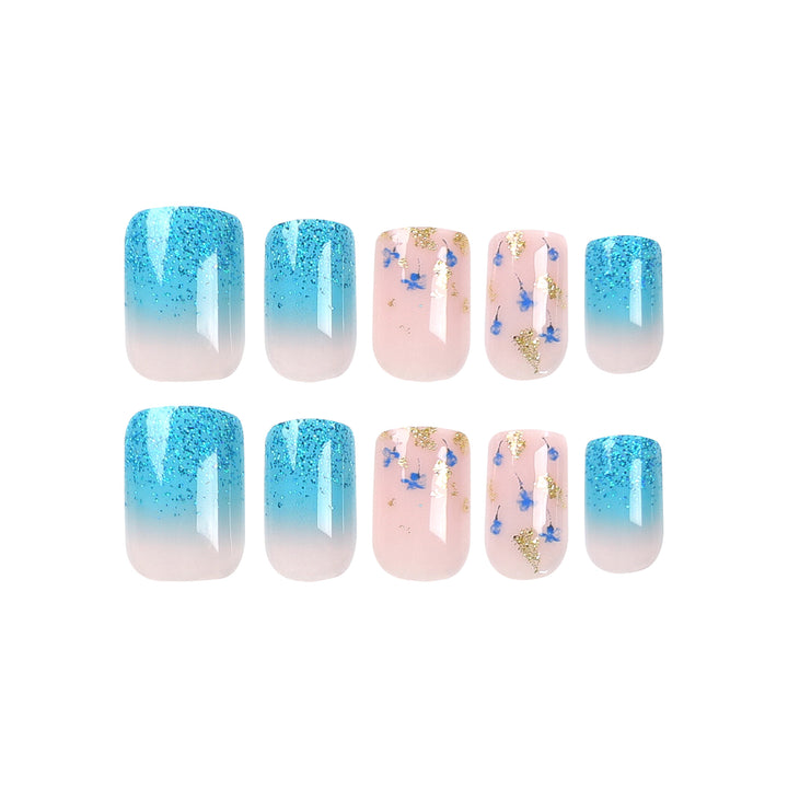Artful acrylic nails with floral design and glitter effects Stornfield
