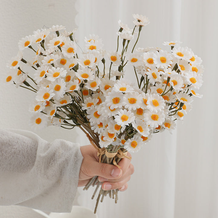Decorative artificial flower arrangement