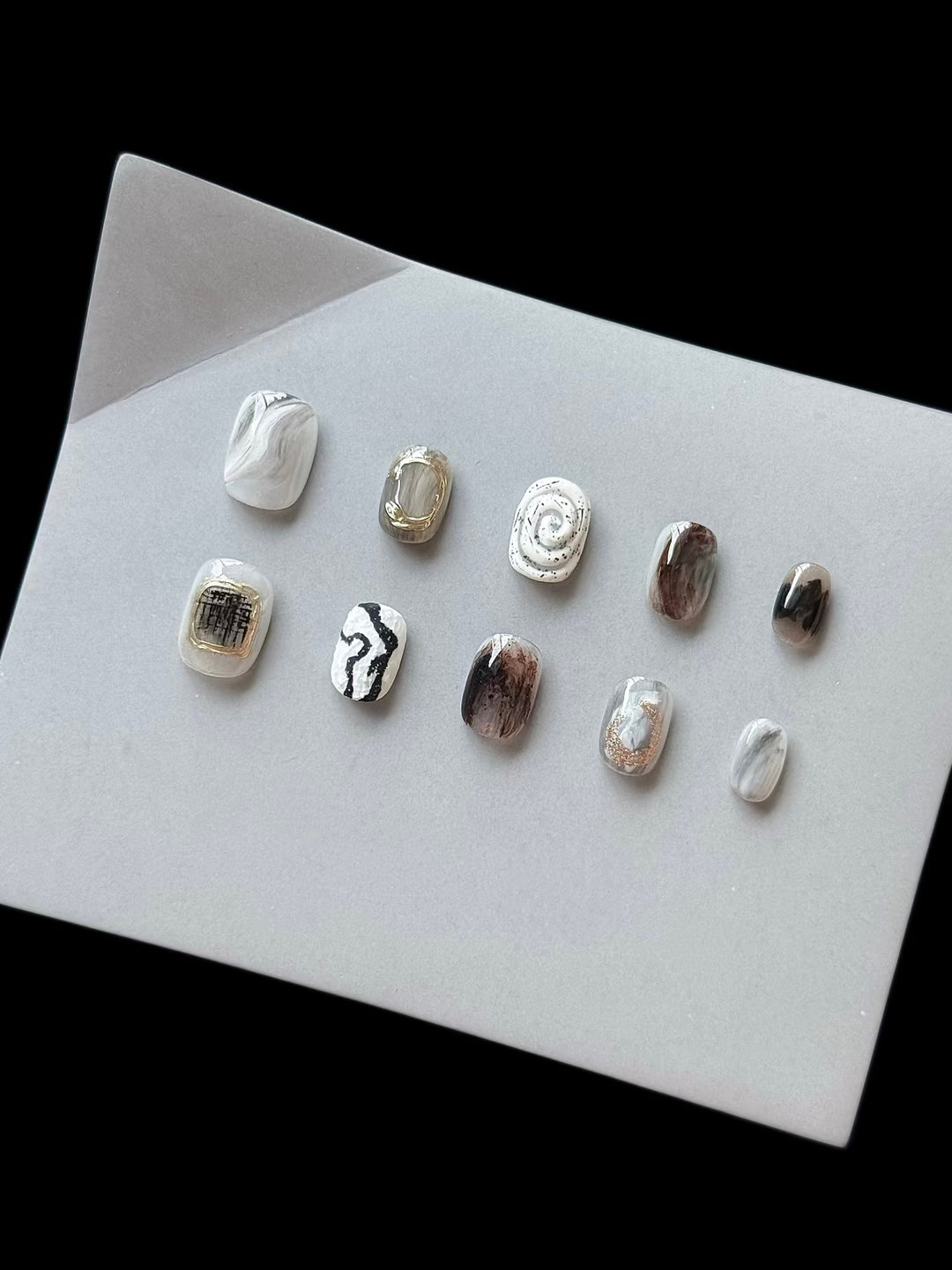 Artistic Press-On Nail Set with Modern Marble and Metallic Accents