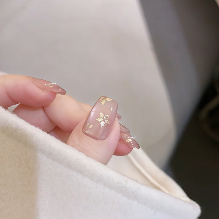 Artificial nails with elegant gold designs Stornfield