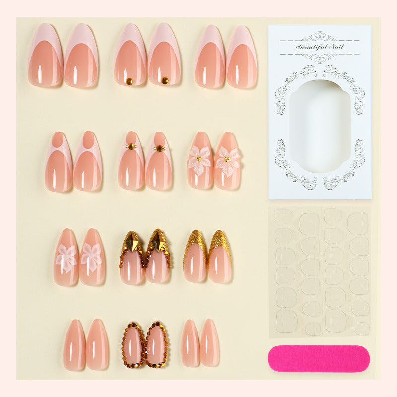 Artificial nail set with elegant flower and gold accents Stornfield
