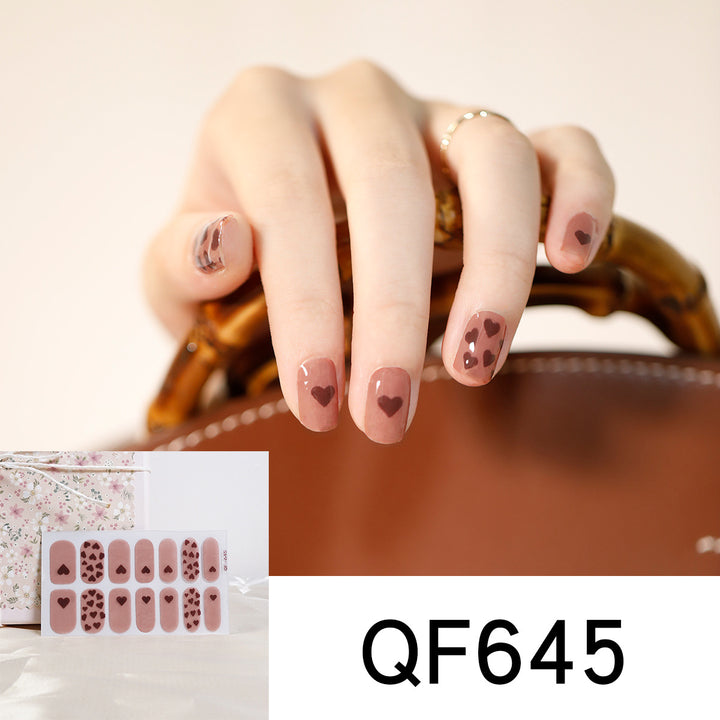 Artificial nail design with heart motif Stornfield