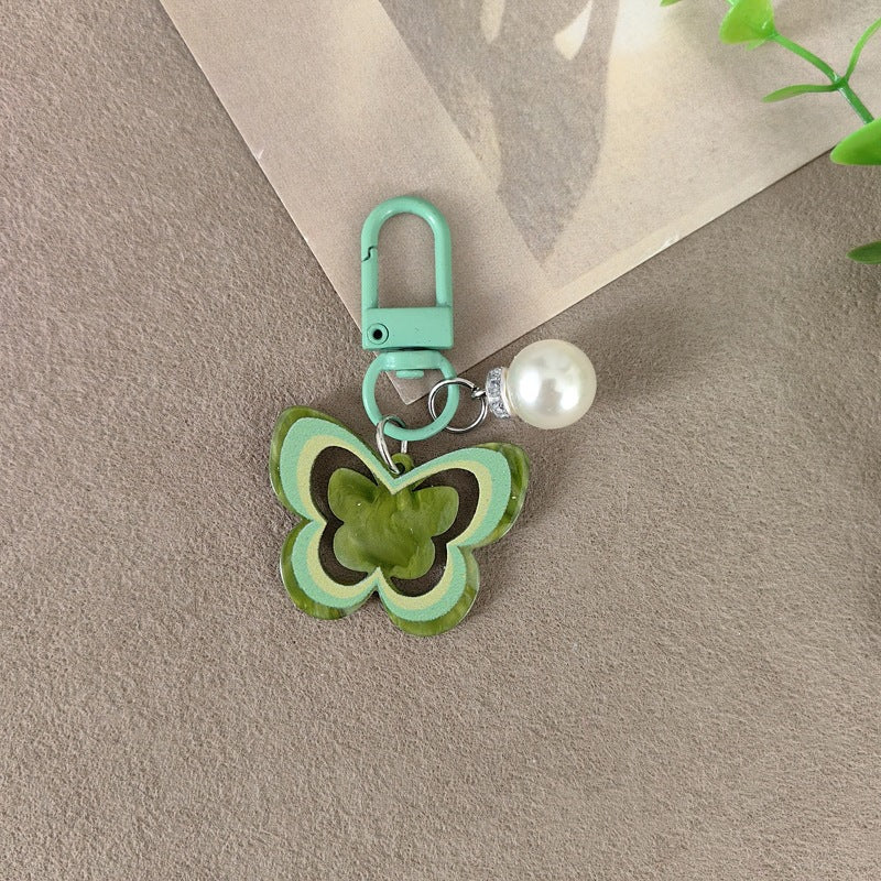 Keychain with butterfly and pearl accent Stornfield