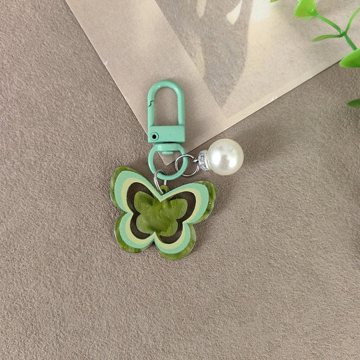 Keychain with butterfly and pearl accent Stornfield