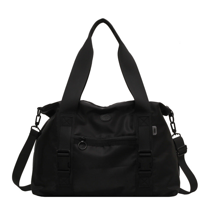Spacious sports duffel bag with ergonomic carrying handles and water-repellent material Stornfield