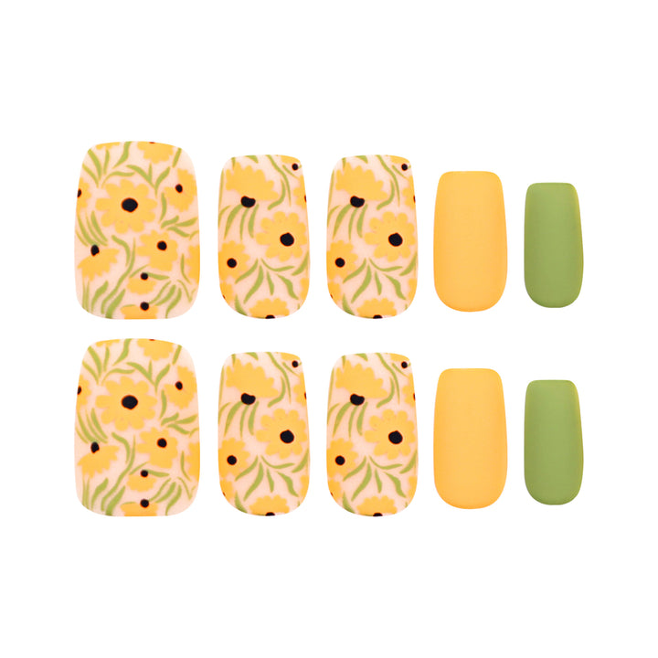 Artistic nail extensions with floral designs and creative color accents Stornfield