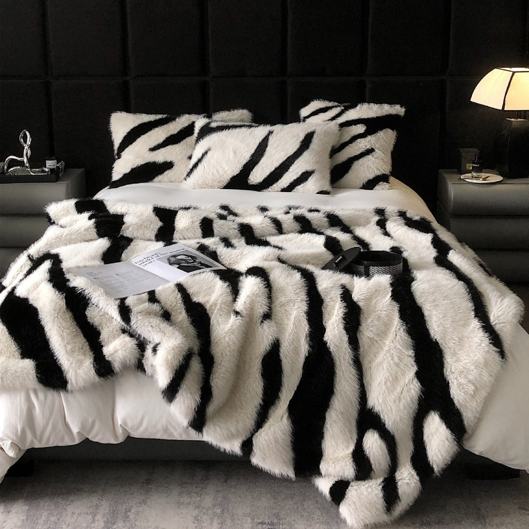 Faux fur bedspread with zebra design and extra fluffy texture