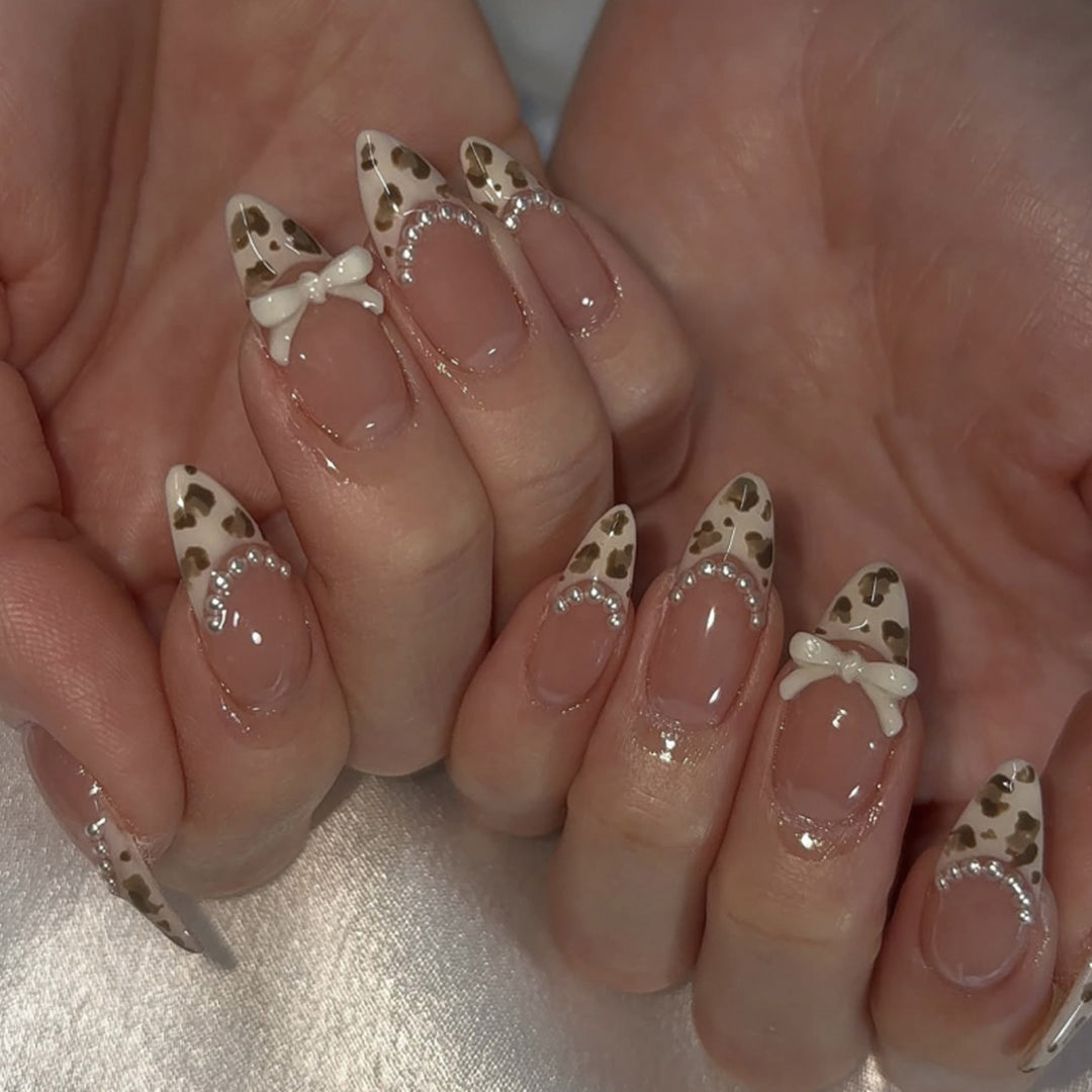Artistic Press-On Nail Set with Bow and Animal Print Stornfield