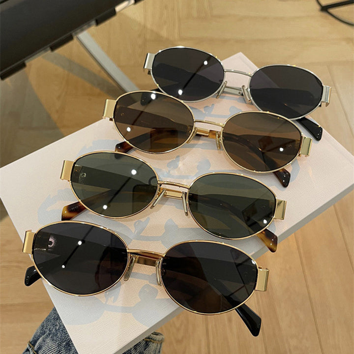 Ladies fashionable sunglasses in an elegant oval design with a sturdy metal frame Stornfield