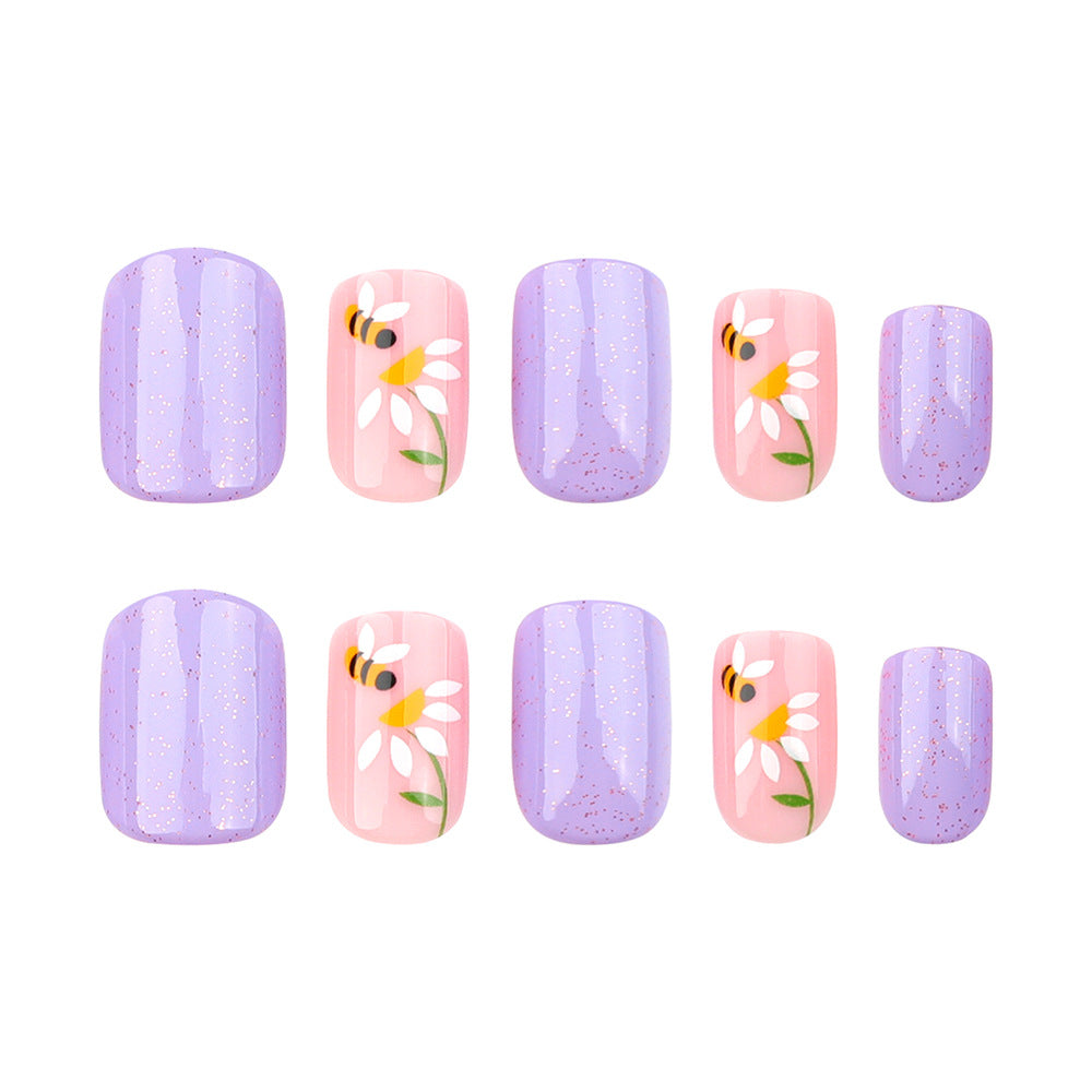 Artfully designed nail extensions with flower design Stornfield