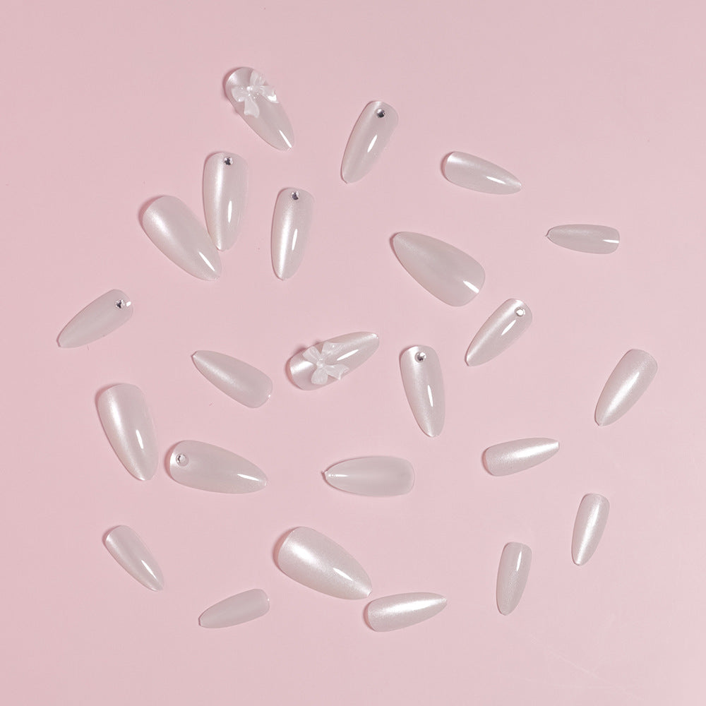 Elegant Stiletto-Shaped Press-On Nails with Decorative Bow Accents Stornfield