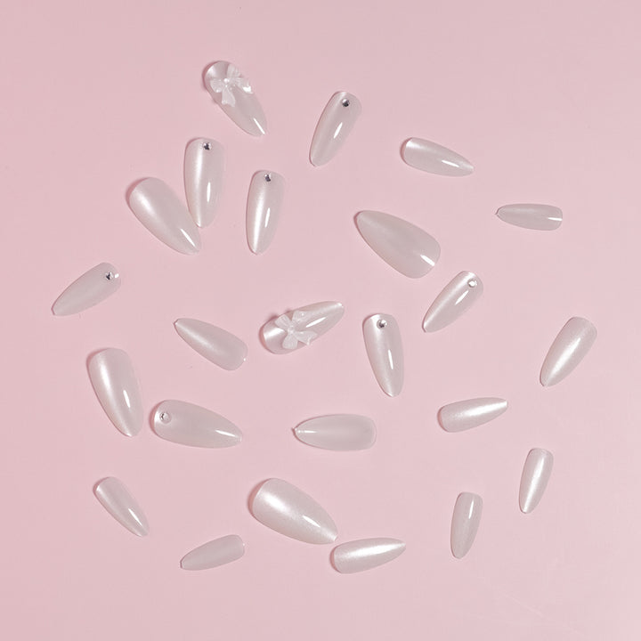Elegant Stiletto-Shaped Press-On Nails with Decorative Bow Accents Stornfield