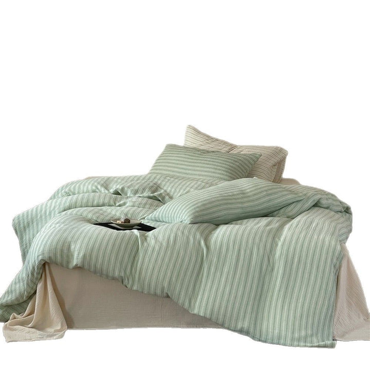 Lightweight muslin bedding set in linen look with fine stripe relief
