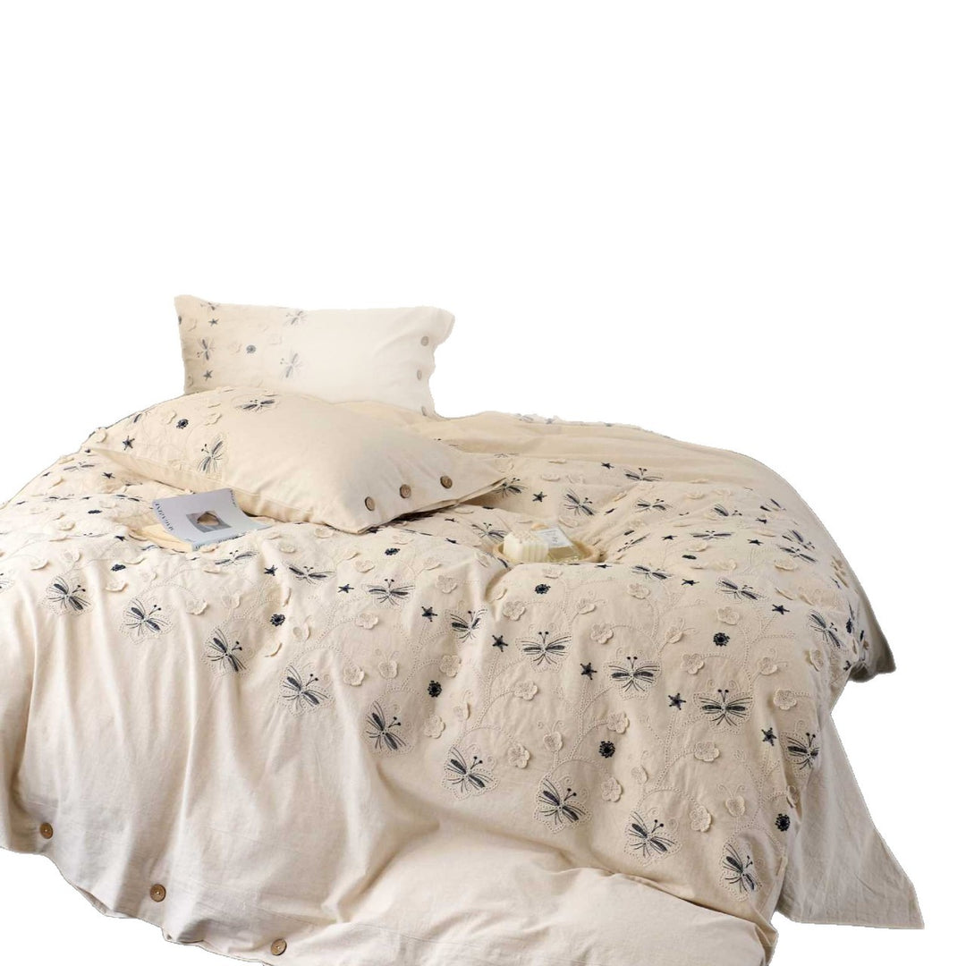 Embroidered cotton bedding set with wooden buttons and butterfly appliqués