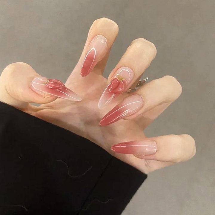Nail set in elegant ombre design with artistic accents Stornfield