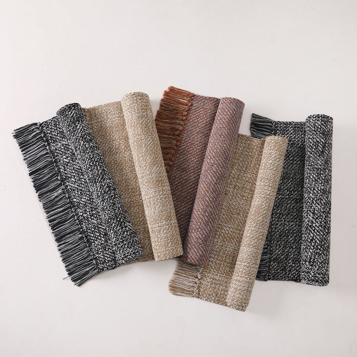 Woven table runner made of cotton blend with fine structure and herringbone look as well as decorative fringes Stornfield